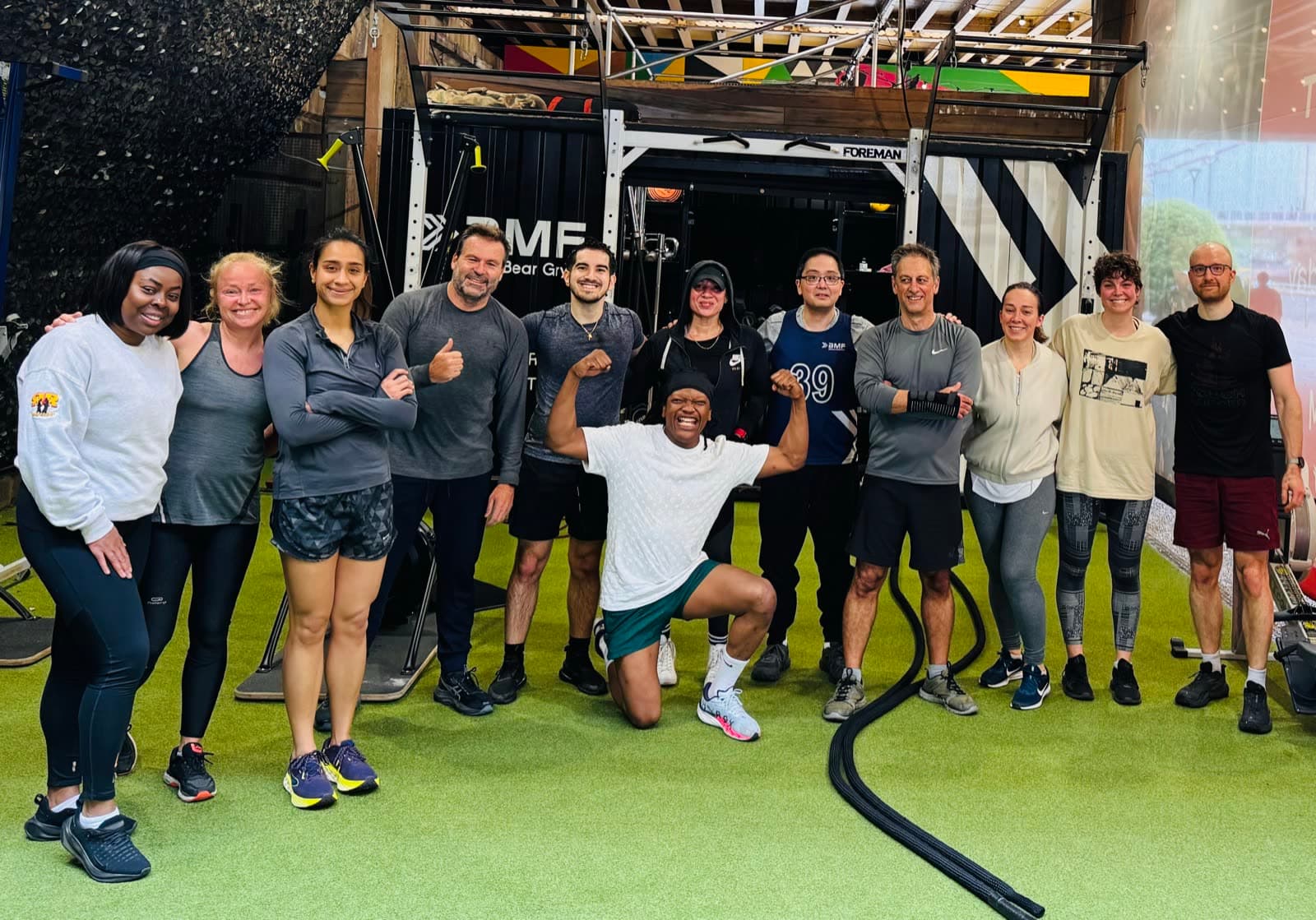 Members lined up on the training turf at BMF Urban Battersea