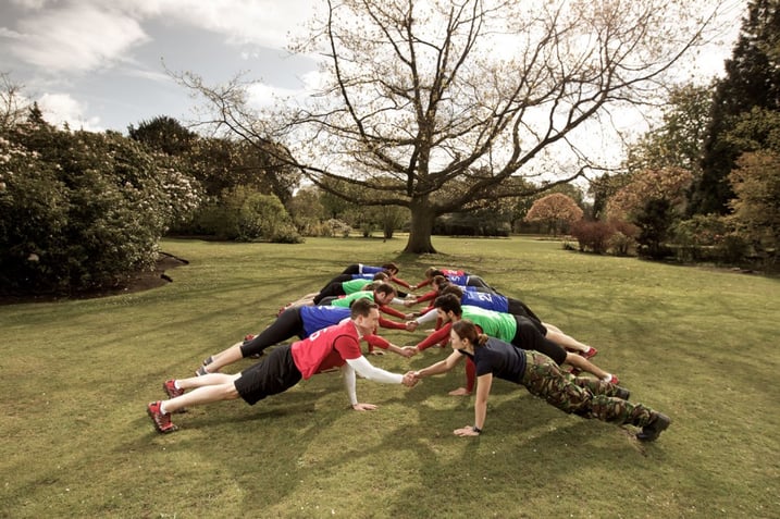 People training in a park bootcamp with BMF
